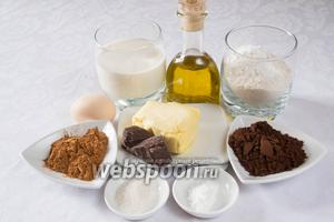 Чтобы испечь шоколадный кекс, необходимо взять: сливочное масло, воду, подсолнечное масло, порошок какао, муку, сахар, соль, сливки, разрыхлитель, яйца, корицу, ванилин.