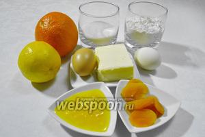 Чтобы приготовить медовый кекс, нужно взять курагу, апельсиновый (любой) ликёр, цедру одного апельсина, яйца, сахар, мёд, муку, масло, лимонный сок, тимьян, разрыхлитель.
