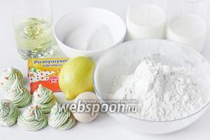 Для приготовления лимонных кексов нам понадобится пшеничная мука, сахар, лимон, масло подсолнечное рафинированное, разрыхлитель, куриное яйцо, соль. Для украшения нам понадобятся ёлочки-безе , сливки для взбивания, сахарная пудра.