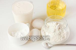 Для приготовления блинов нам понадобится ряженка, пшеничная мука, куриные яйца, сода, сахарная пудра и подсолнечное рафинированное масло.