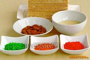 Для приготовления десерта нужно взять сливочные вафли, сгущённое молоко с сахаром, миндаль и разноцветную кокосовую стружку.
