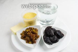 Чтобы приготовить кукурузную кашу с сухофруктами, нужно взять кукурузную крупу 1 мультистакан, воду 4 мультистакана, сливочное масло, вяленый чернослив, изюм и соль.
