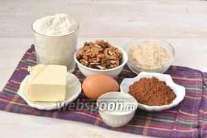 Для приготовления пирога нам понадобится мука, орехи, сахар, яйца, масло, разрыхлитель, какао.