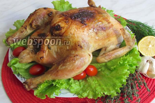 Фото Курица запечённая с лимоном, чесноком и травами