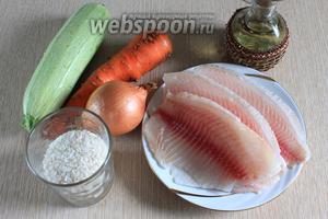 Для приготовления нам понадобятся филе рыбы, кабачок, рис, яйцо куриное, лук репчатый, томатная паста, морковь, масло растительное, масло сливочное, соль, вода, перец чёрный молотый, специи для рыбы.