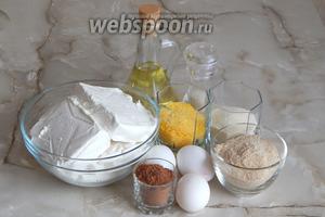 Апельсиново-шоколадные сырники мы будем готовить их таких продуктов, как: творог (жирность не имеет значения), яйца куриные, какао-порошок, апельсиновый сахар, сухари панировочные, манная крупа, соль и масло растительное без запаха.