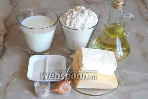 Чтобы приготовить обезьяний хлеб с сыром и чесноком, нам потребуются: мука пшеничная, молоко, масло подсолнечное и сливочное, сыр твёрдый, соль, сахар, дрожжи сухие, чеснок.