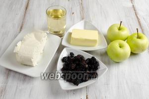 Чтобы приготовить десерт, нужно взять для запекания: яблоки белый налив, вино, масло; для начинки яблок: творог, изюм.