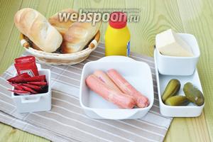 Для приготовления хот-догов я использую petit Bread . Булочки-петиты идеальны для хот-догов. Горчицу не используйте русскую, она очень ядрёная, берите французскую или дижонскую. Кетчуп, маринованные огурцы, сосиски, сыр.