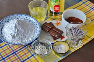 Для приготовления этого шоколадного печенья (без муки) возьмём горький шоколад, сахарную пудру, яичные белки (комнатной температуры!), какао-порошок, немного белого винного уксуса, щепотку соли и 80 г шоколадных капель (или поломанного на кусочки шоколада).