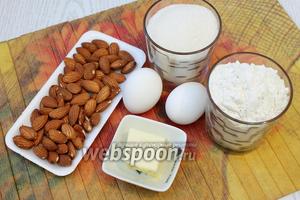 Для приготовления нам понадобятся яйца куриные, сахар, мёд, мука пшеничная, сливочное масло, разрыхлитель и миндаль.