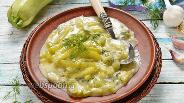 Фото рецепта Кабачки тушёные с сыром и зеленью
