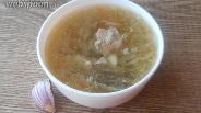 Фото рецепта Суп с квашеной капустой, свининой и белыми грибами